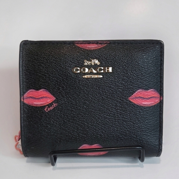 Coach Handbags - Coach Lips Print Black Canvas & Leather Snap Wallet C3324